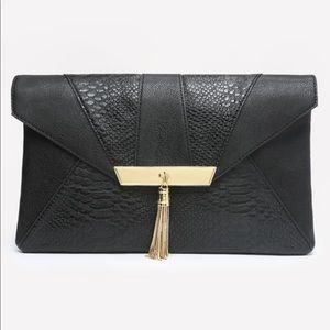 Bebe “Riko Tassel Clutch
